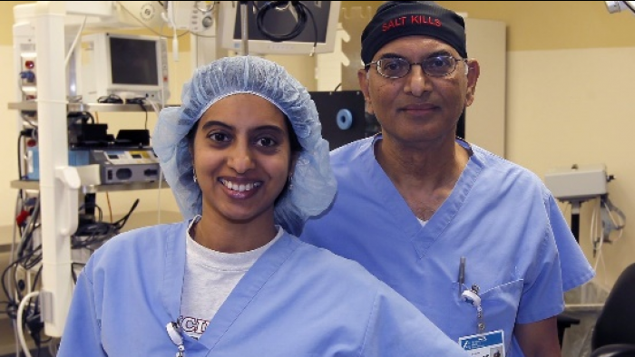 Drs. Soumya and Surender Neravetla in the OR.