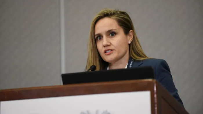 Dr. Woodard at the podium