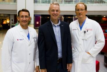 Rep. Steve Russell with STS members Jess L. Thompson III, MD (left) and Harold M. Burkhart, MD (right) at the Children’s Hospital of Oklahoma.